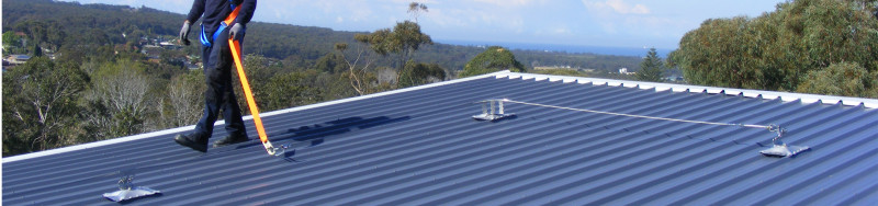 Roof Safety System Installer On Roof